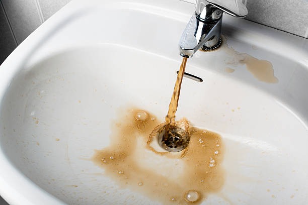 dirty water coming from sink of the kitchen